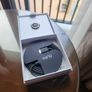 Oura Black and Gold Ring